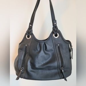 Leather like purse with shoulder straps and multiple pockets